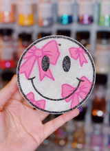 Load image into Gallery viewer, Smiley Bow Car Air Freshener